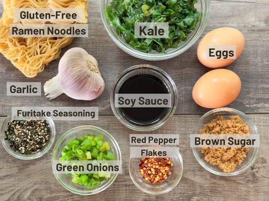 Labeled ingredients on a board for making the TikTok ramen recipe.