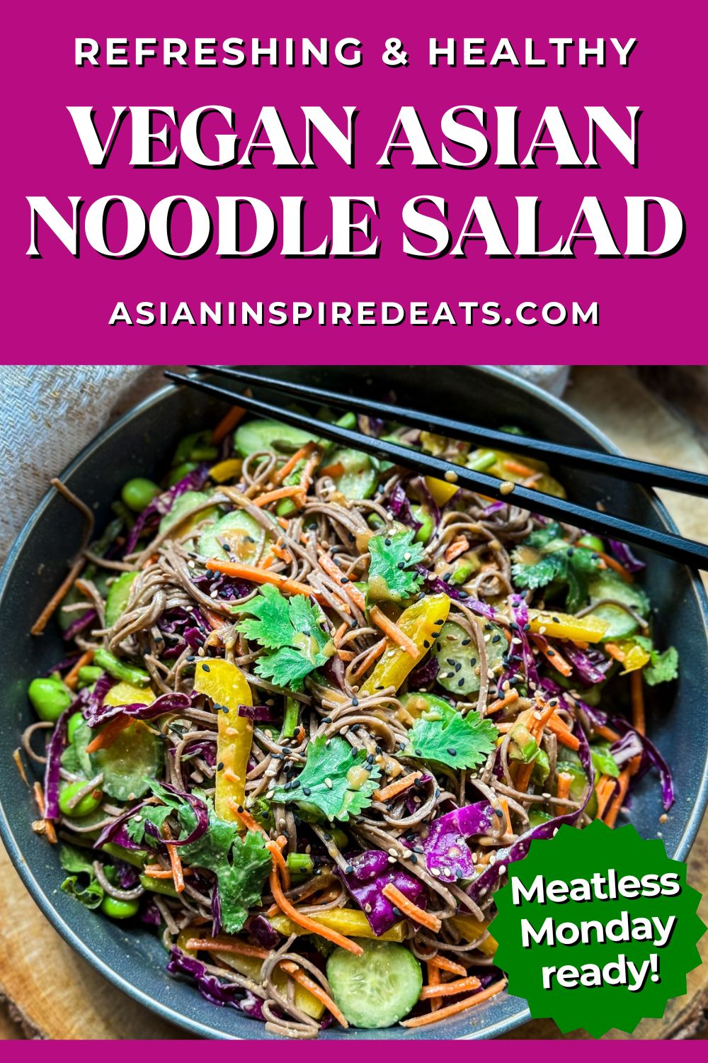 A Pinterest pin of Vegan Asian Noodle Salad with an image of a vibrant soba noodle salad in a gray bowl with a pair of black chopsticks on top.